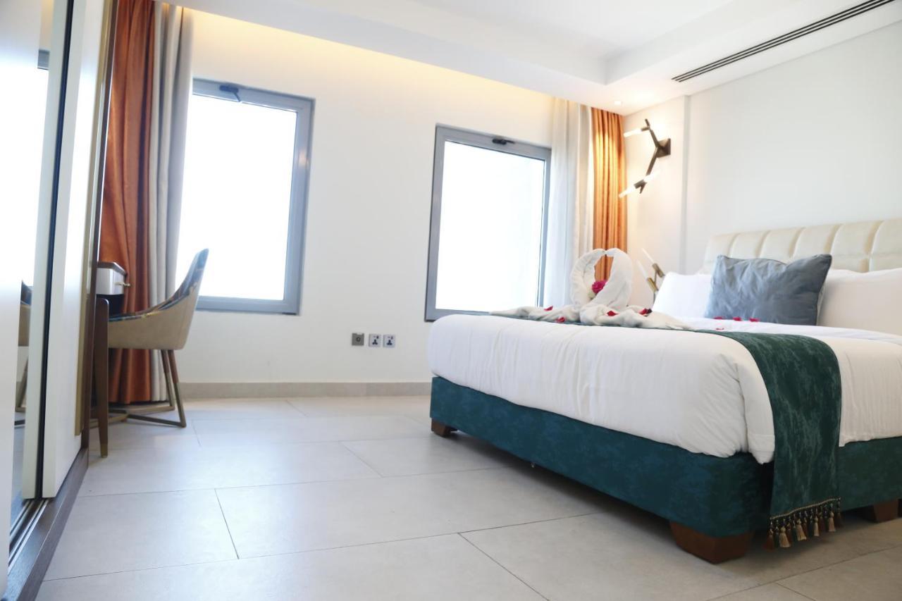 Waterfront Hotel Apartment Lusail Dış mekan fotoğraf A room at the hotel