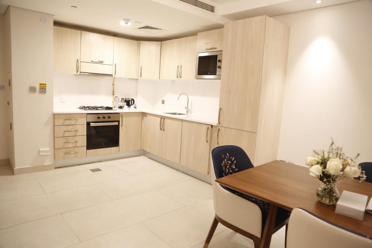 Waterfront Hotel Apartment Lusail Dış mekan fotoğraf A kitchen in a serviced apartment in London