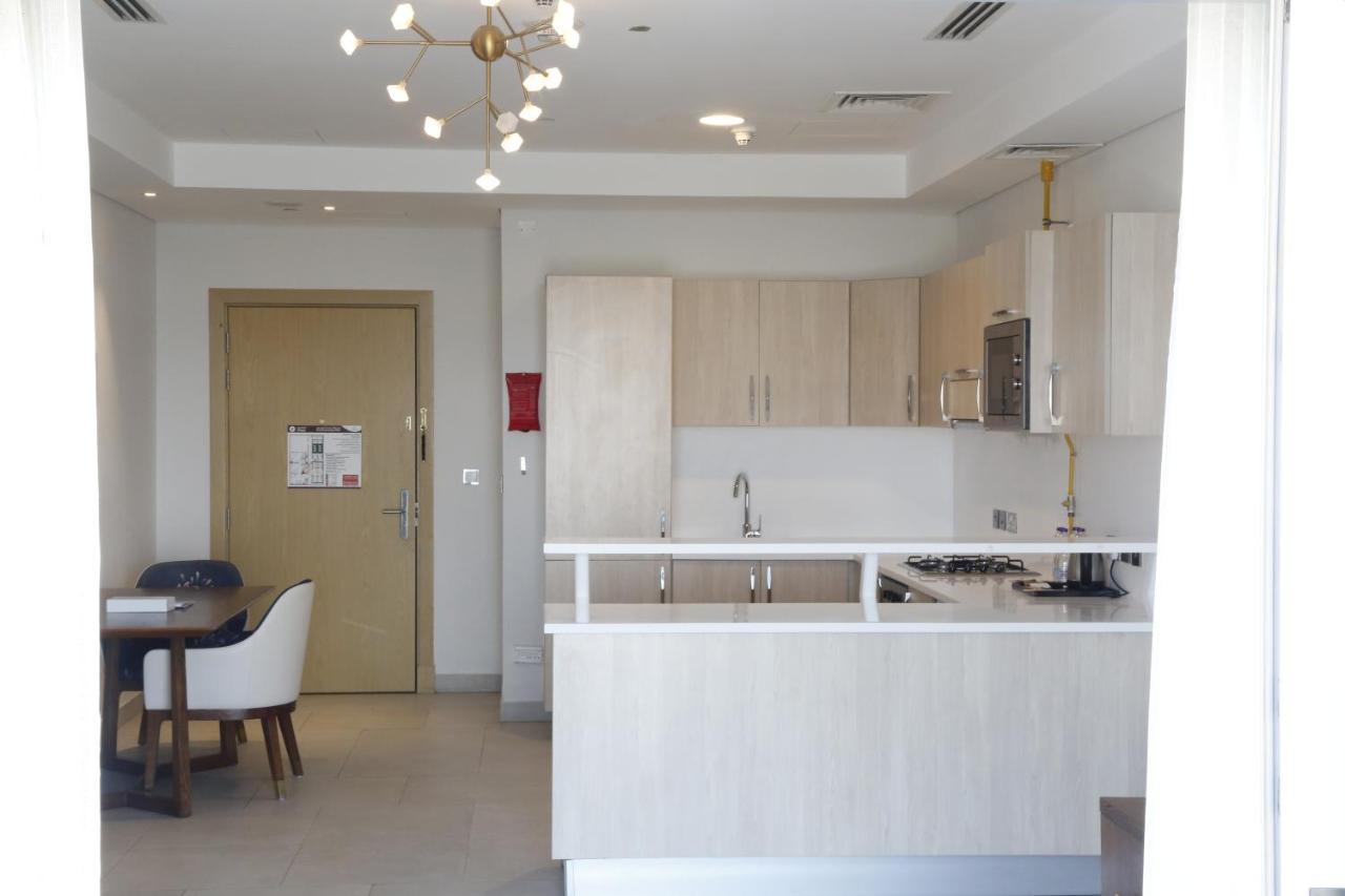 Waterfront Hotel Apartment Lusail Dış mekan fotoğraf A kitchen in a typical apartment